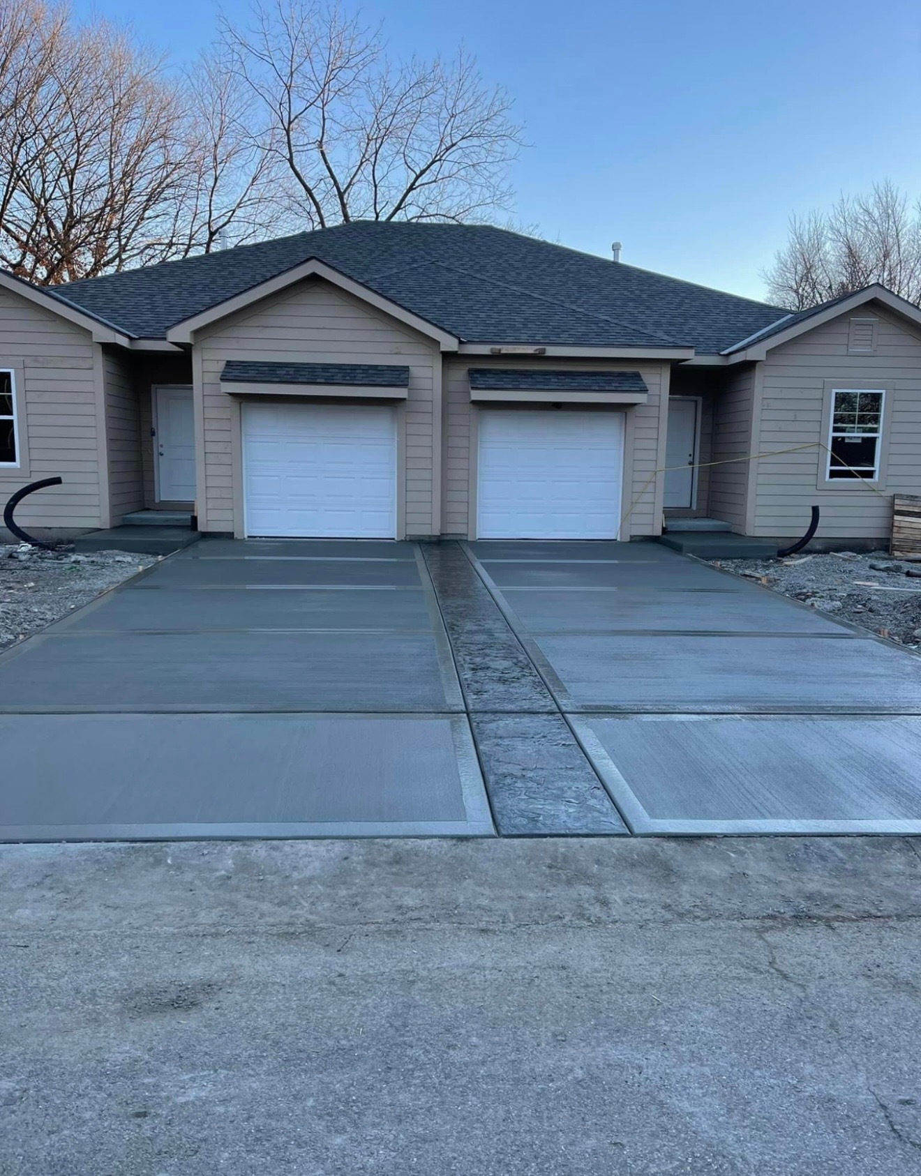 New concrete driveways poured for duplex homes under construction in the Kansas City area